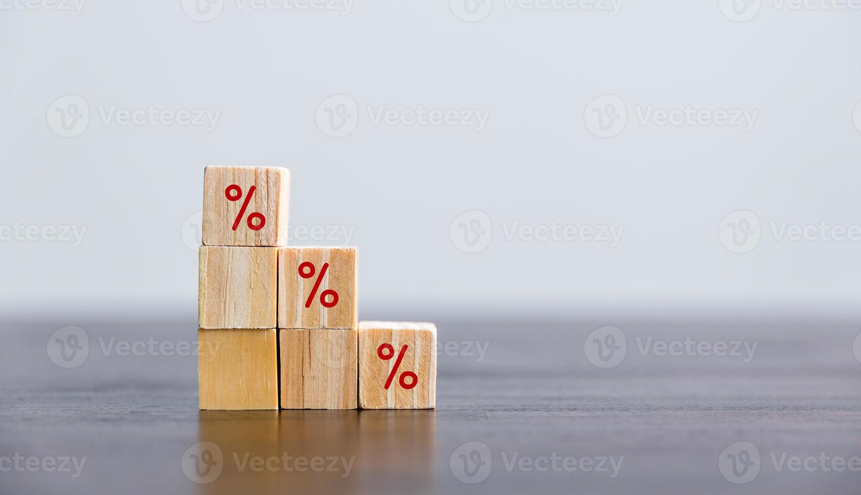 Closeup wood cubes with percentage symbol, business interest, discount investment, financial growth, interest rate increase, sale price and tax rise, future gain, market digital concept photo
