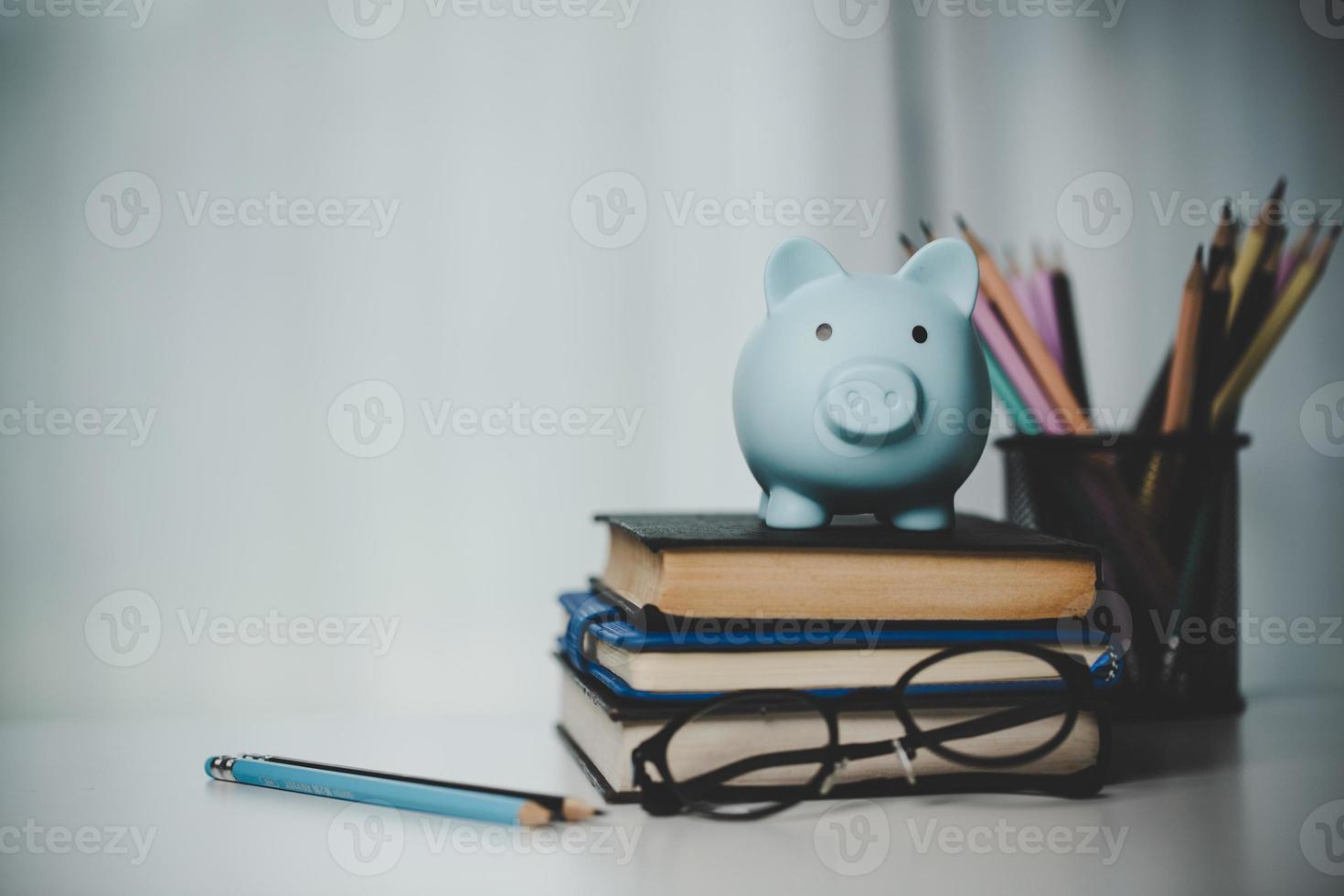 close-up education object with stack money coin-cash dollar and glass jar on background. Concept to saving money income for study, Calculating student finance costs and investment budget loan photo