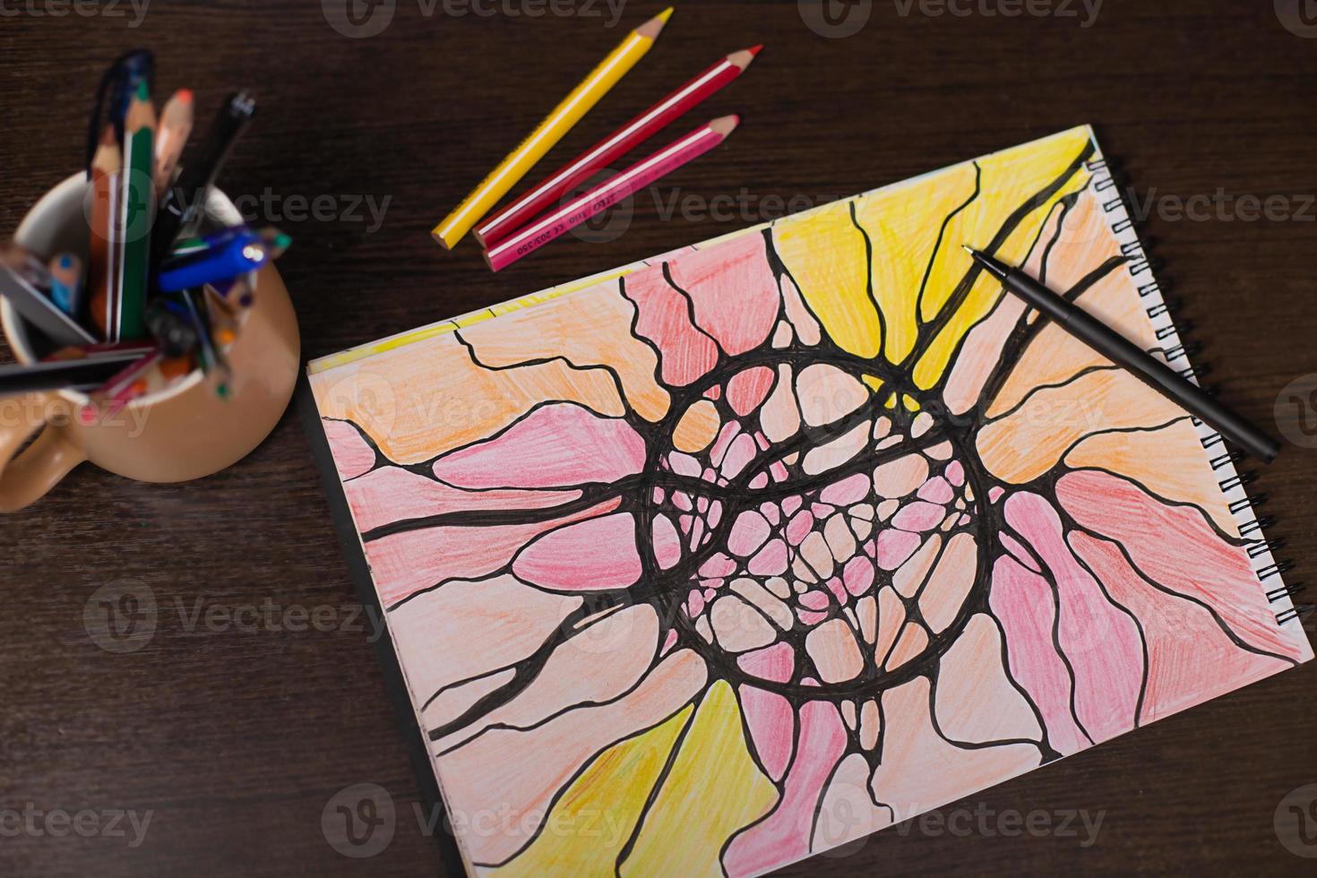 Black marker pen on a multicolored drawing from neurographic lines. neurographics as a psychological technique photo