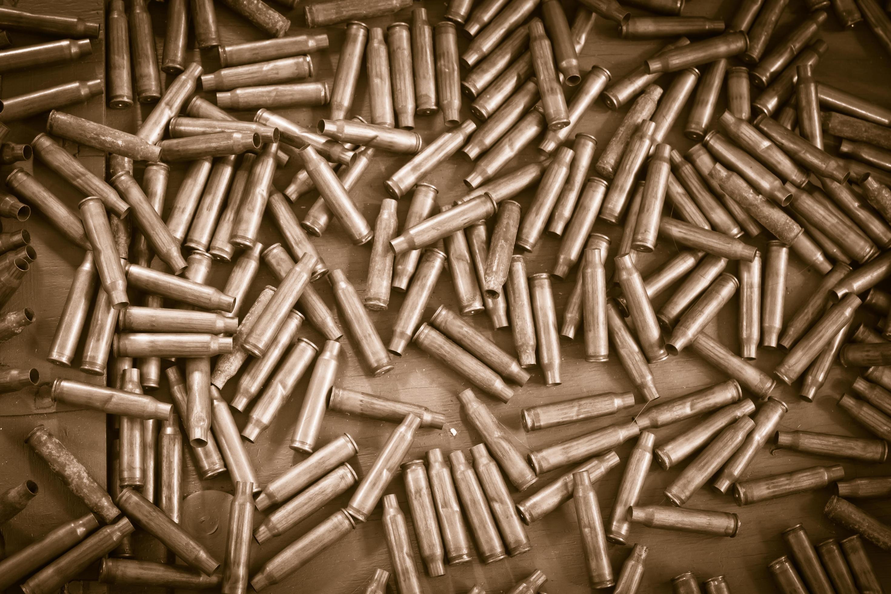 Pile of bullets background 12320773 Stock Photo at Vecteezy