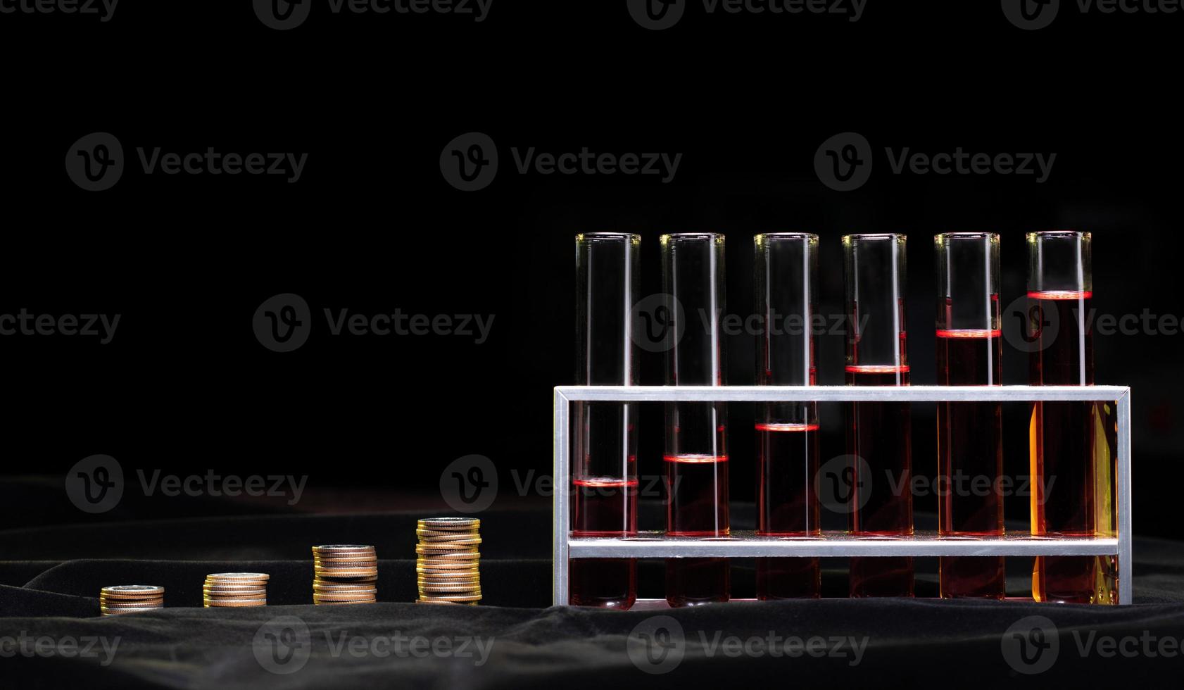 Research and Development is money saving finance for health care and wealth. Concept Stack coin growth economy graph to lab test tube. Science increase profit success in market, copy space photo
