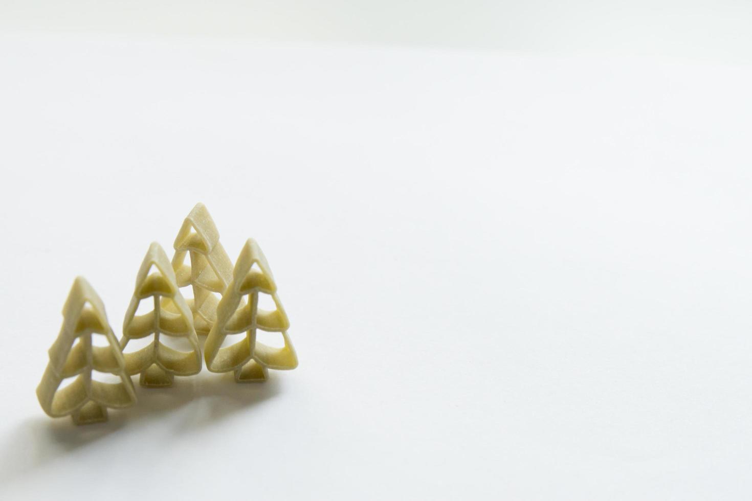 Winter pattern. Green tree shaped pasta photo