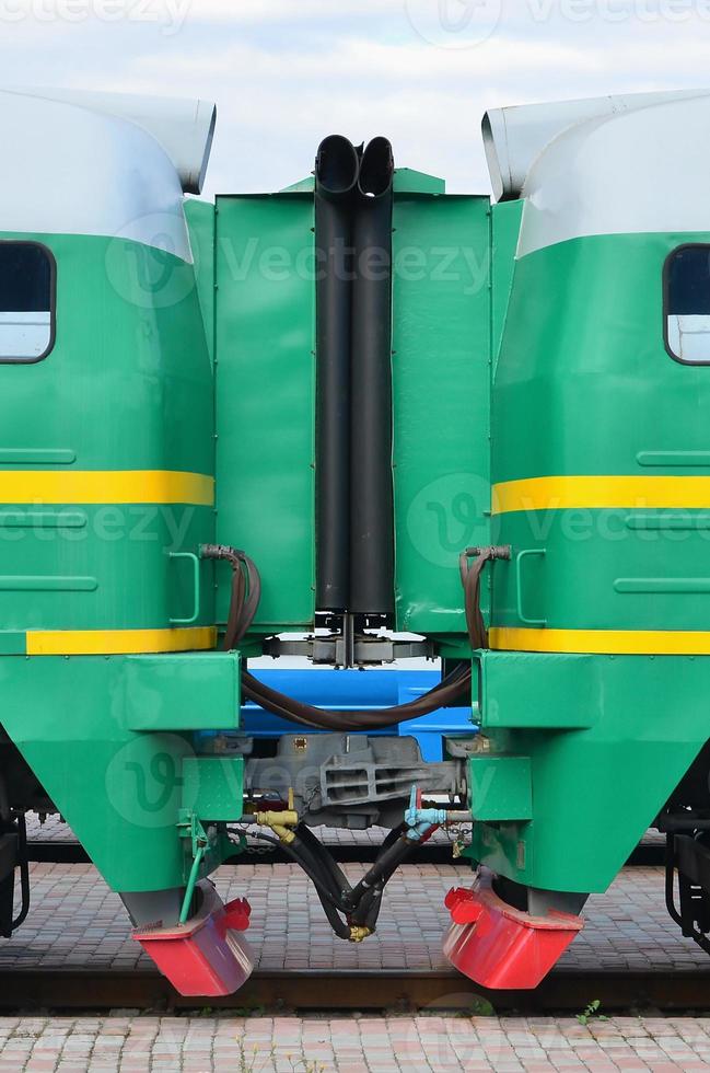 Transition between two electric trains. A small corridor in the role of a portal between the two sides of the cabin of a Russian electric train photo