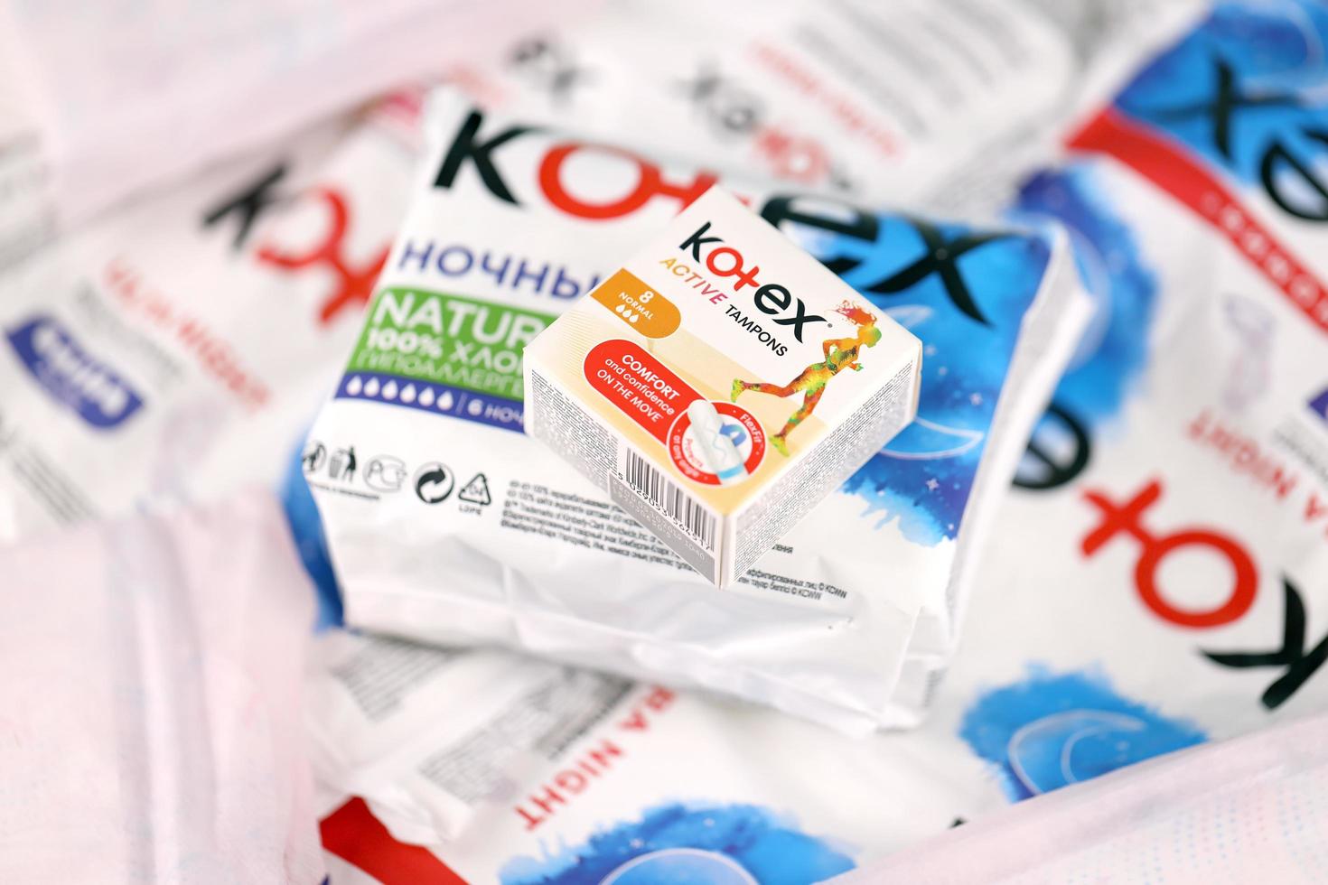 KHARKIV, UKRAINE - DECEMBER 16, 2021 Kotex production with logo. Kotex is a brand of feminine hygiene products, includes maxi, thin and ultra thin pads. photo