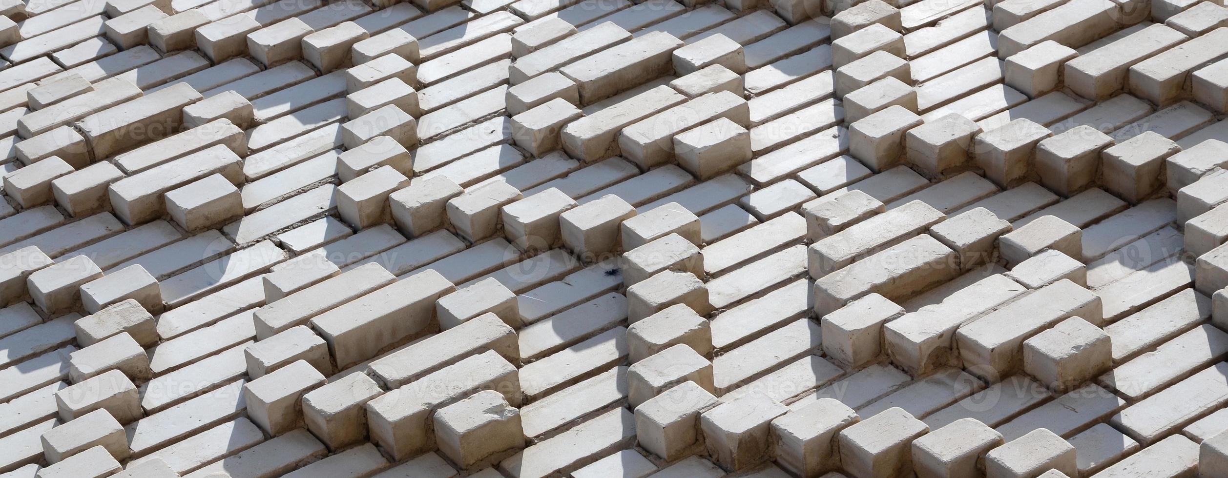 A pattern made of white bricks in the form of diamond shapes. Decoration of the walls during the Soviet Union photo