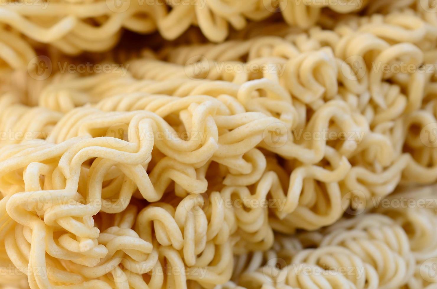 Close up view of yellow dry instant noodles. Chinese traditional food