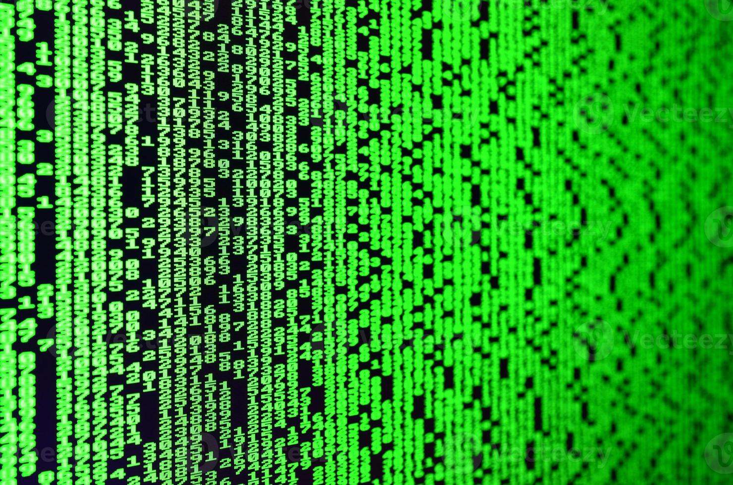 Macro of password selection on the monitor of the office computer. The concept of hacking the protection of a personal data keeper. The stream of supposed digital passwords of four and five digits photo