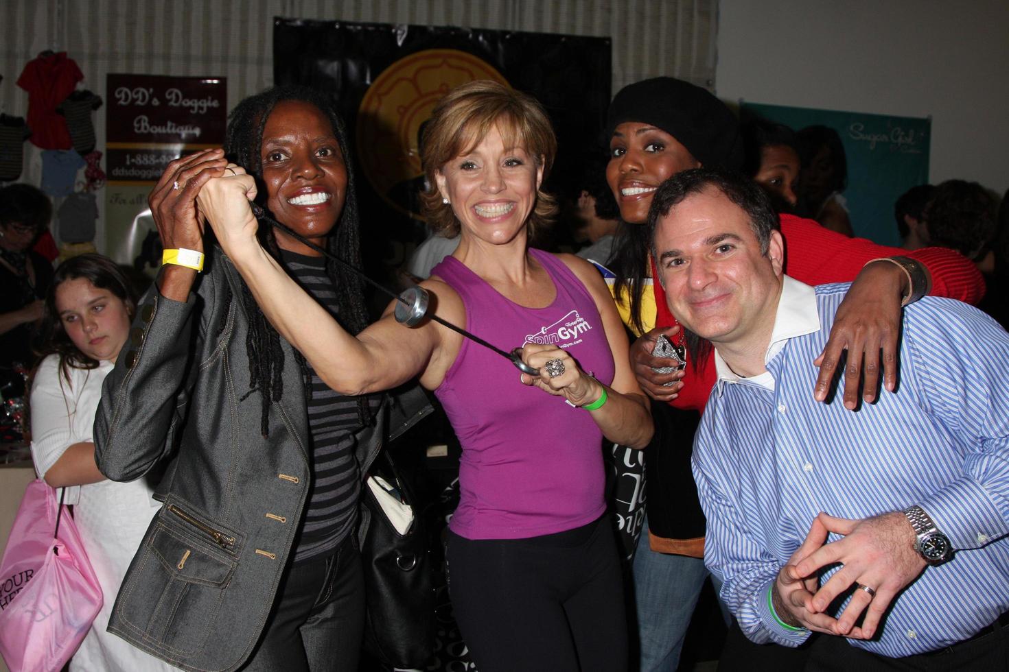 LOS ANGELES, NOV 20 -  Omarosa and Mom, Forbes Riley, Gil R. Tatarsky at the Connected s Celebrity Gift Suite celebrating the 2010 American Music Awards at Ben Kitay Studios on November 20, 2010 in Los Angeles, CA photo