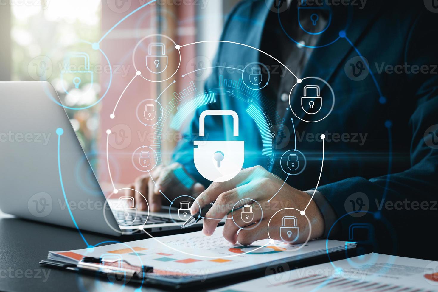 Cybersecurity and privacy concepts to protect data. Lock icon and internet network security technology. Businessmen protecting personal data on laptop and virtual interfaces. photo