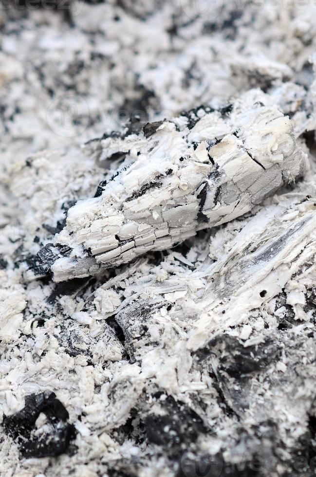 Pile of ashes after the fire went out grunge background texture photo