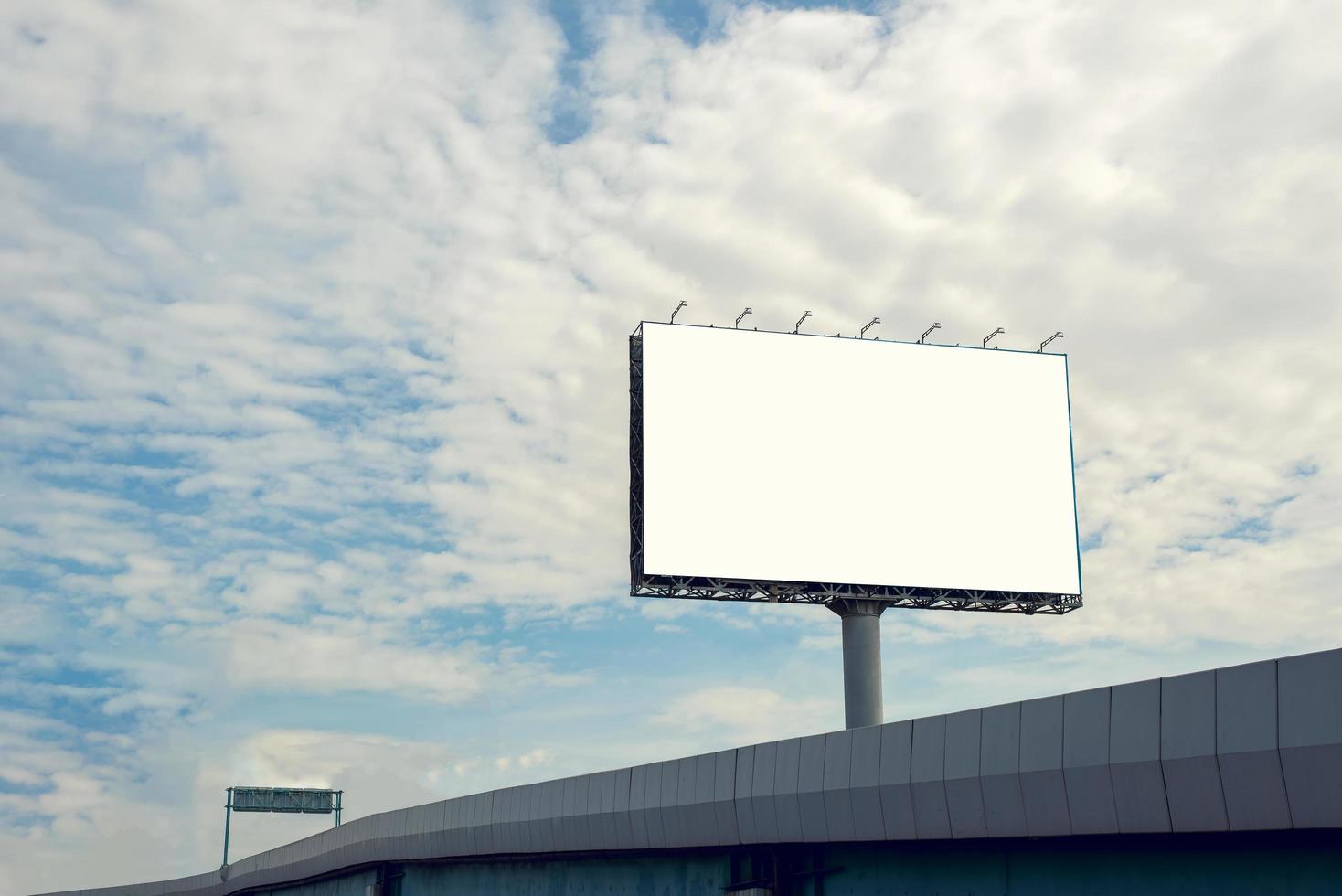 Billboard blank with blue sky for outdoor advertising poster photo