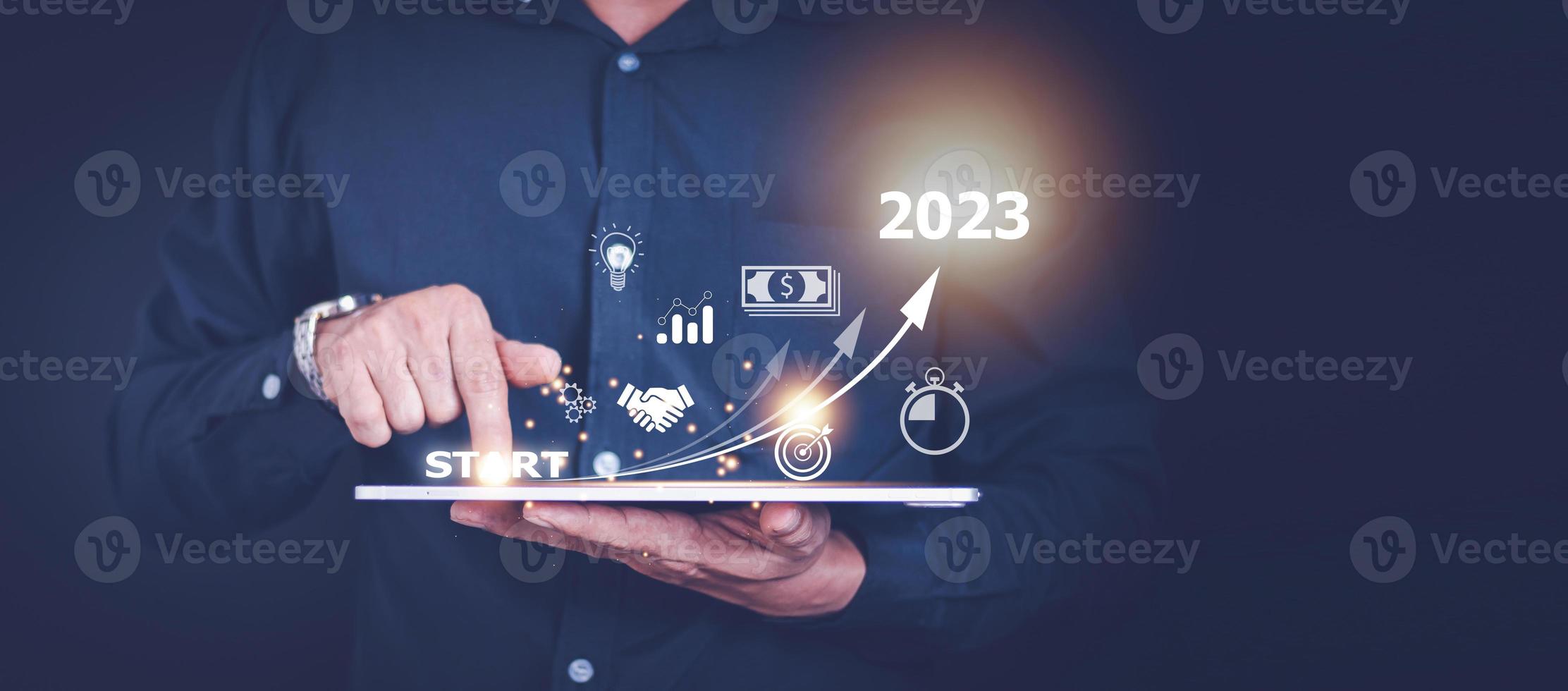 Startup concept with icon business and network connection on modern virtual interface from digital tablet. man touching on tablet. online business, e-comers, online marketing photo