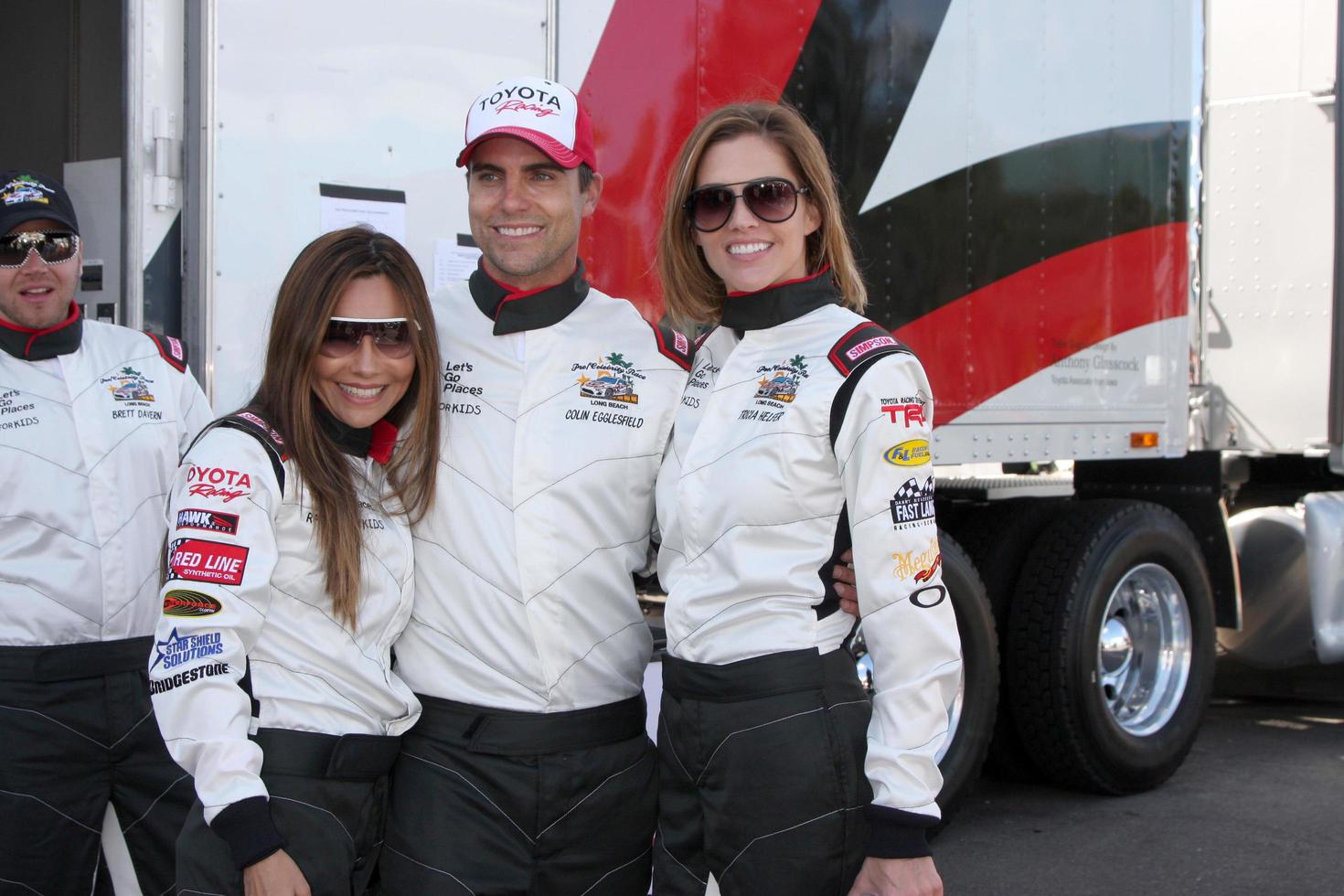 LOS ANGELES, APR 1 - Vanessa Marcel, Colin Egglesfield, Tricia Helfer at the Toyota Grand Prix of Long Beach Pro Celebrity Race Press Day at Long Beach Grand Prix Raceway on April 1, 2014 in Long Beach, CA photo
