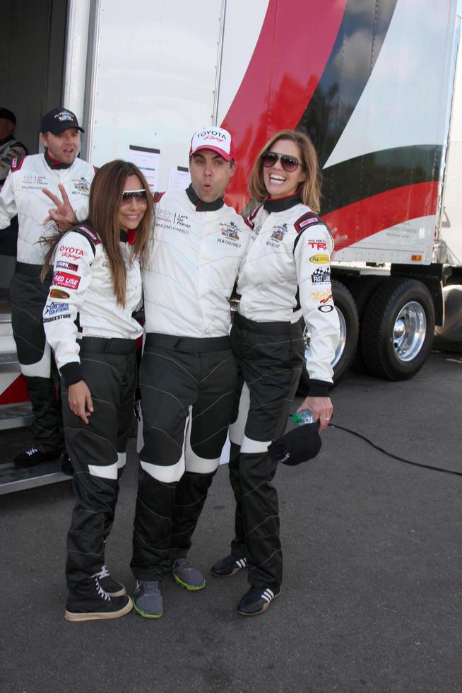 LOS ANGELES, APR 1 - Vanessa Marcel, Colin Egglesfield, Tricia Helfer at the Toyota Grand Prix of Long Beach Pro Celebrity Race Press Day at Long Beach Grand Prix Raceway on April 1, 2014 in Long Beach, CA photo