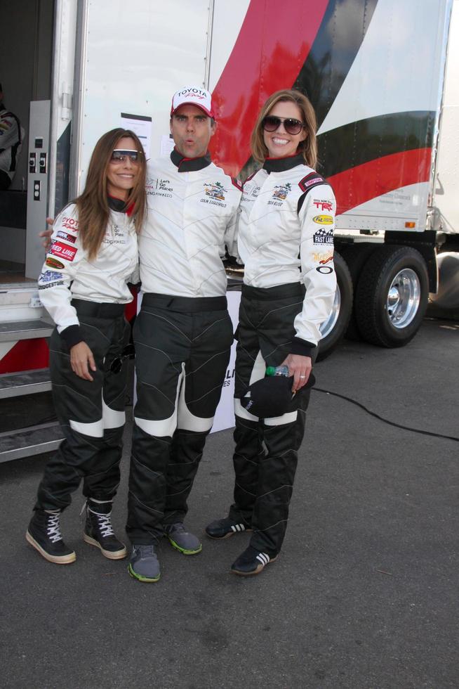 LOS ANGELES, APR 1 - Vanessa Marcel, Colin Egglesfield, Tricia Helfer at the Toyota Grand Prix of Long Beach Pro Celebrity Race Press Day at Long Beach Grand Prix Raceway on April 1, 2014 in Long Beach, CA photo