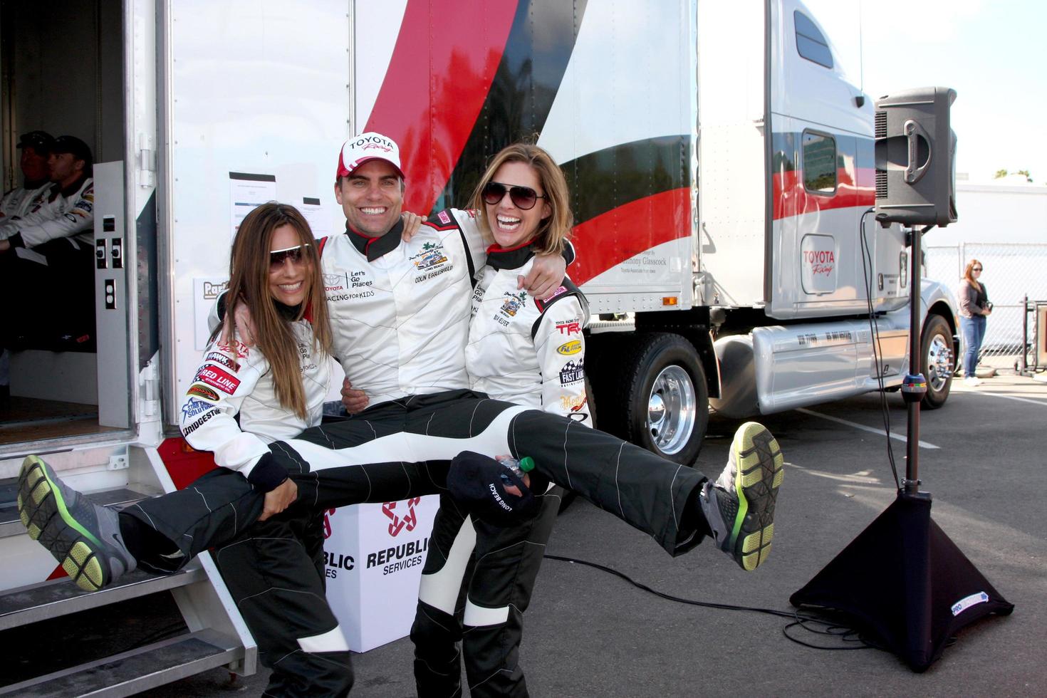 LOS ANGELES, APR 1 - Vanessa Marcel, Colin Egglesfield, Tricia Helfer at the Toyota Grand Prix of Long Beach Pro Celebrity Race Press Day at Long Beach Grand Prix Raceway on April 1, 2014 in Long Beach, CA photo