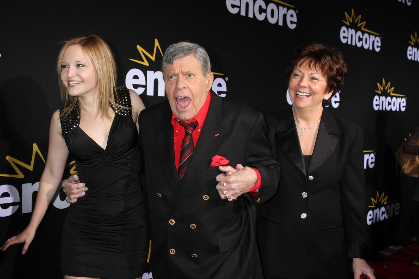 LOS ANGELES, DEC 7 - Daughter Danielle Sarah Lewis, Jerry Lewis, wife SanDee Pitnick arrives at the Premiere Of Encore s Method To The Madness Of Jerry Lewis at Paramount Studios Theater on December 7, 2011 in Los Angeles, CA photo