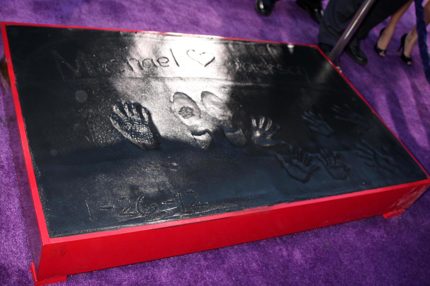 LOS ANGELES, JAN 26 - Michael Jackson Hand and Footprints, and his children s handprints at the Michael Jackson Immortalized Handprint and Footprint Ceremony at Graumans Chinese Theater on January 26, 2012 in Los Angeles, CA photo