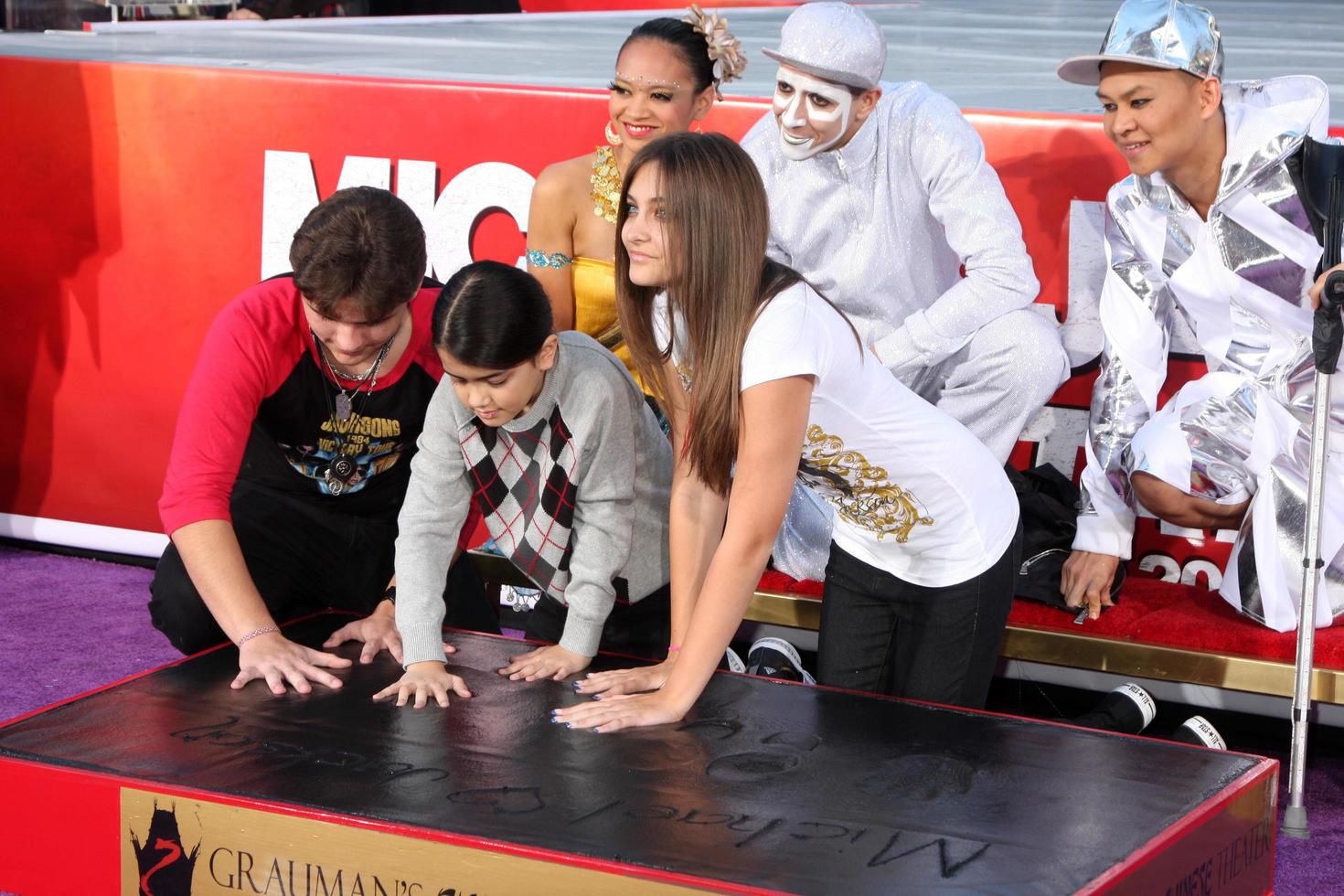 LOS ANGELES, JAN 26 - Prince Michael Jackson, Prince Michael Jackson, II aka Blanket Jackson, Paris Jackson at the Michael Jackson Immortalized Handprint and Footprint Ceremony at Graumans Chinese Theater on January 26, 2012 in Los Angeles, CA photo
