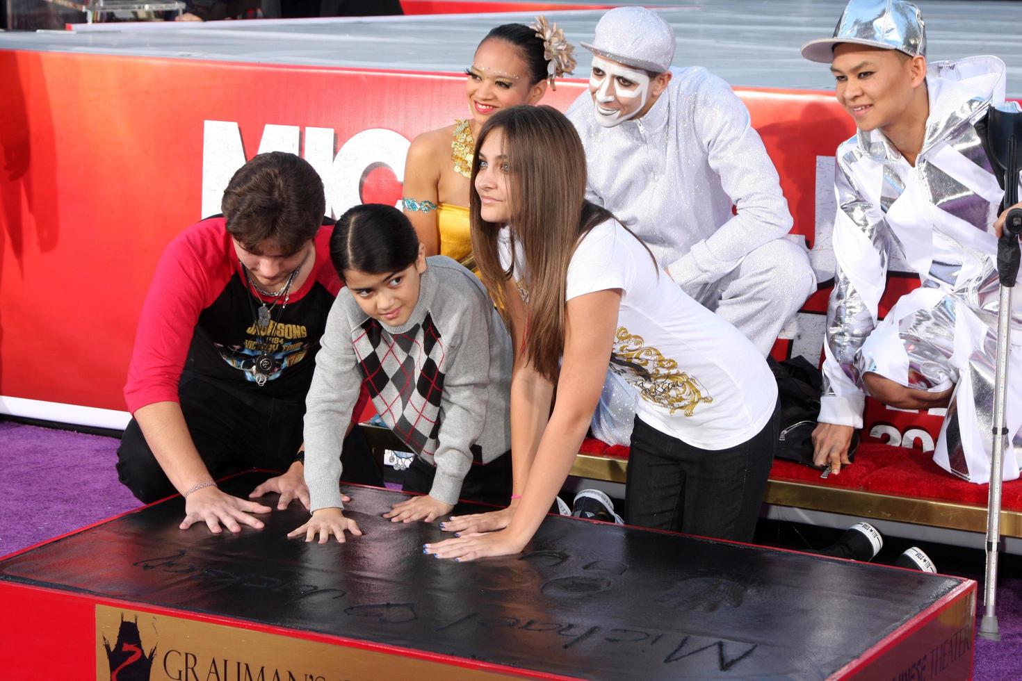 LOS ANGELES, JAN 26 - Prince Michael Jackson, Prince Michael Jackson, II aka Blanket Jackson, Paris Jackson at the Michael Jackson Immortalized Handprint and Footprint Ceremony at Graumans Chinese Theater on January 26, 2012 in Los Angeles, CA photo