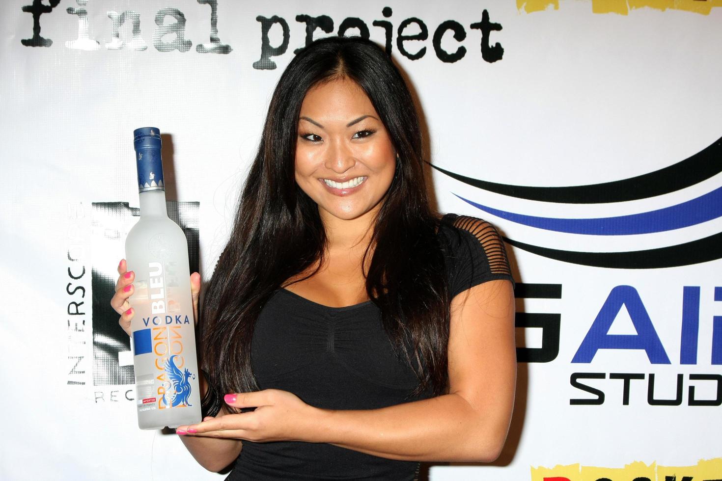 LOS ANGELES, SEPT 22 - Liquor being modeled at the after-party for  Archie s Final Project  presented by Big Air Studios, Rocket Releasing, and Interscope Records at Track 16, Bergamot Station on September 22, 2011 in Santa Monica, CA photo