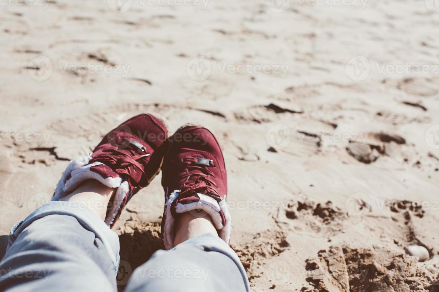 Girl relaxing on sand beach photo