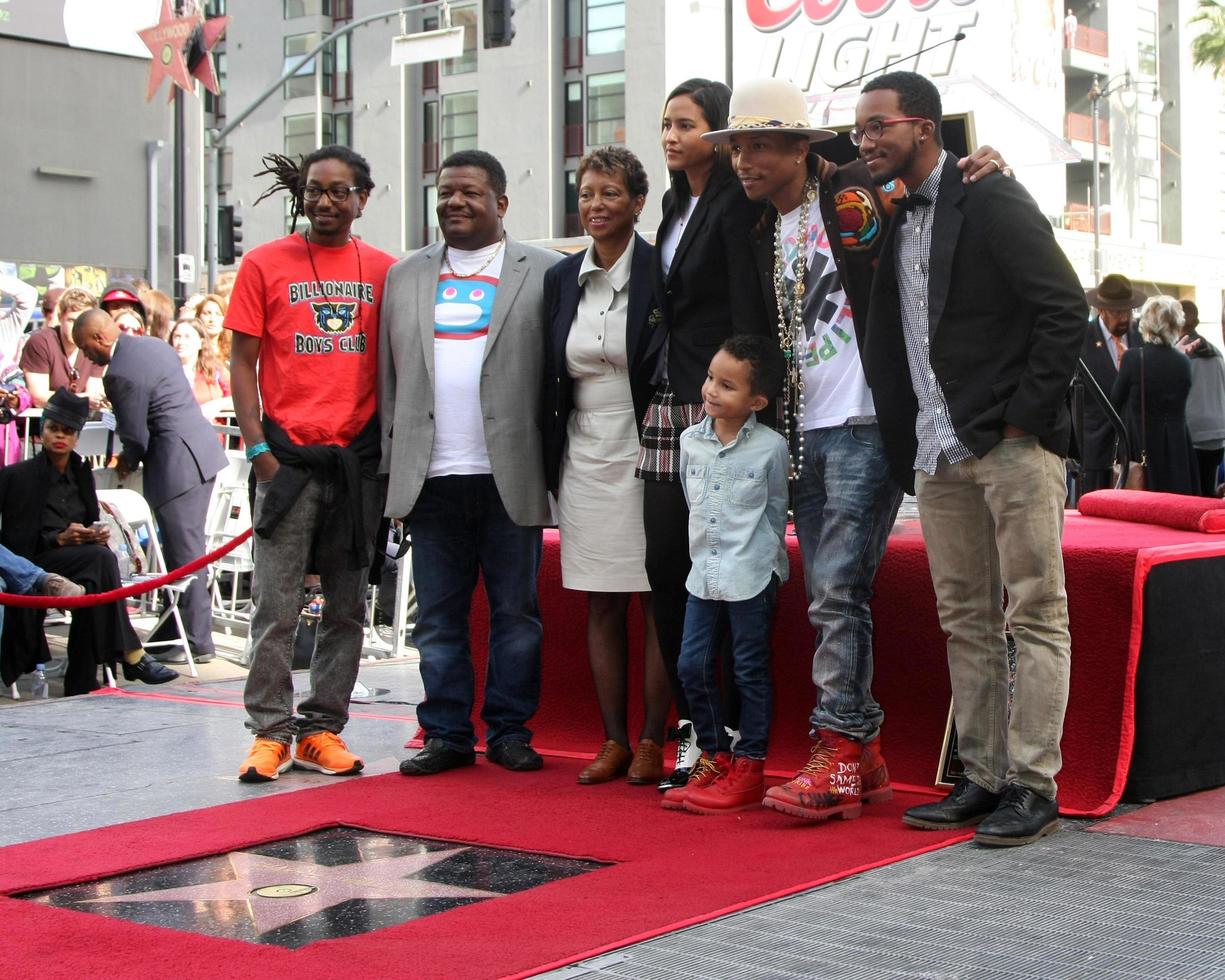 LOS ANGELES, DEC 4 - Helen Lasichanh, Rocket Ayer Williams, Pharrell Williams, Family at the Pharrell Williams Hollywood Walk of Fame Star Ceremony at the W Hotel Hollywood on December 4, 2014 in Los Angeles, CA photo