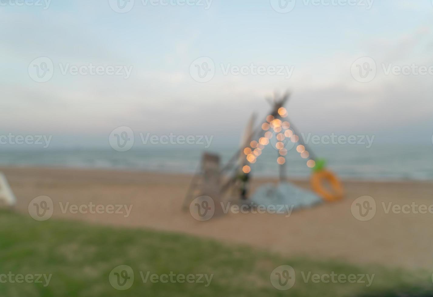 abstract blur camping yard on beach for background photo