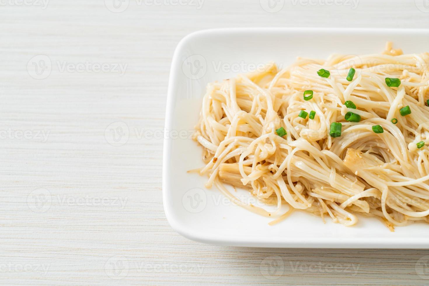 stir-fried golden needle mushroom with butter photo