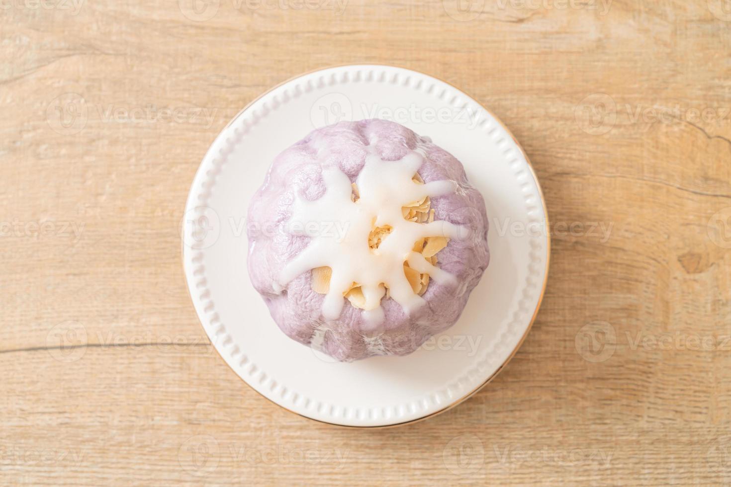 taro bun with white sugar cream and nut photo