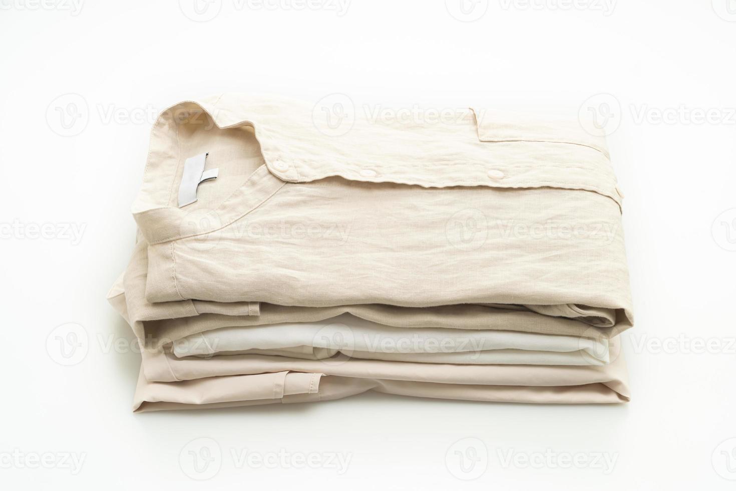 beige shirt fold on white background photo