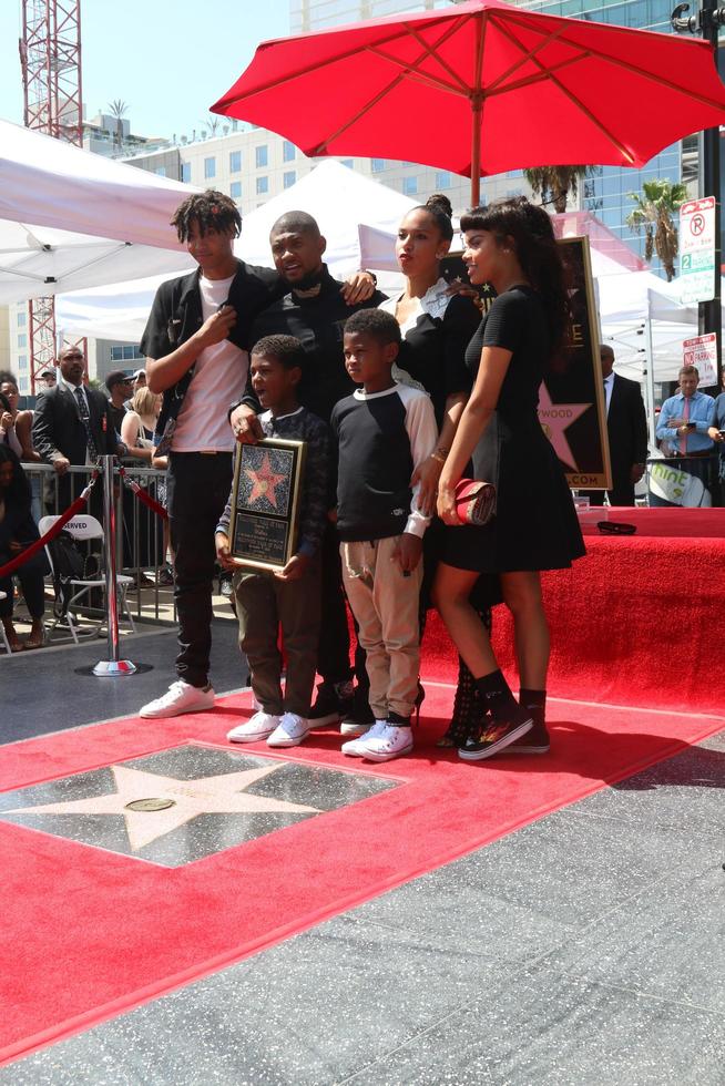 LOS ANGELES, SEP 7 - Guest, Usher Raymond IV, wife Grace Miguel, Guest front Naviyd Ely Raymond, Usher Raymond V at the Usher Honored With a Star On The Hollywood Walk Of Fame at the Eastown on September 7, 2016 in Los Angeles, CA photo