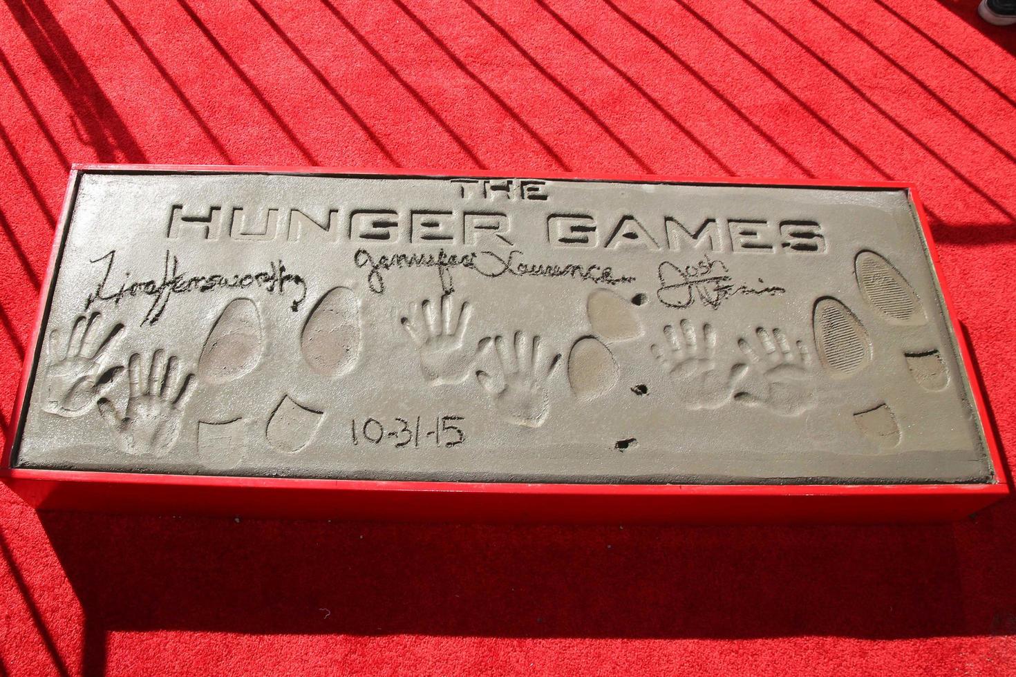 LOS ANGELES, OCT 31 -  Josh Hutcherson, Jennifer Lawrence, Liam Hemsworth Hunger Games Handprints Footprints at the Hunger Games Handprint and Footprint Ceremony at the TCL Chinese Theater on October 31, 2015 in Los Angeles, CA photo