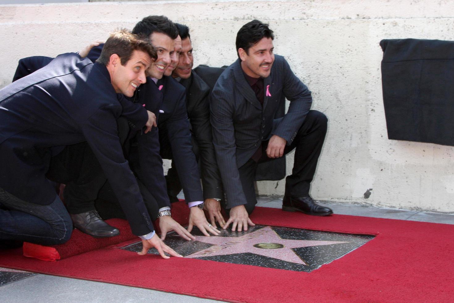LOS ANGELES, OCT 9 -  New Kids On The Block, Jordan Knight, Donnie Wahlberg, Joe McIntyre, Danny Wood, Jonathan Knight at the New Kids On the Block Hollywood Walk of Fame Star Ceremony at Hollywood Boulevard on October 9, 2014 in Los Angeles, CA photo