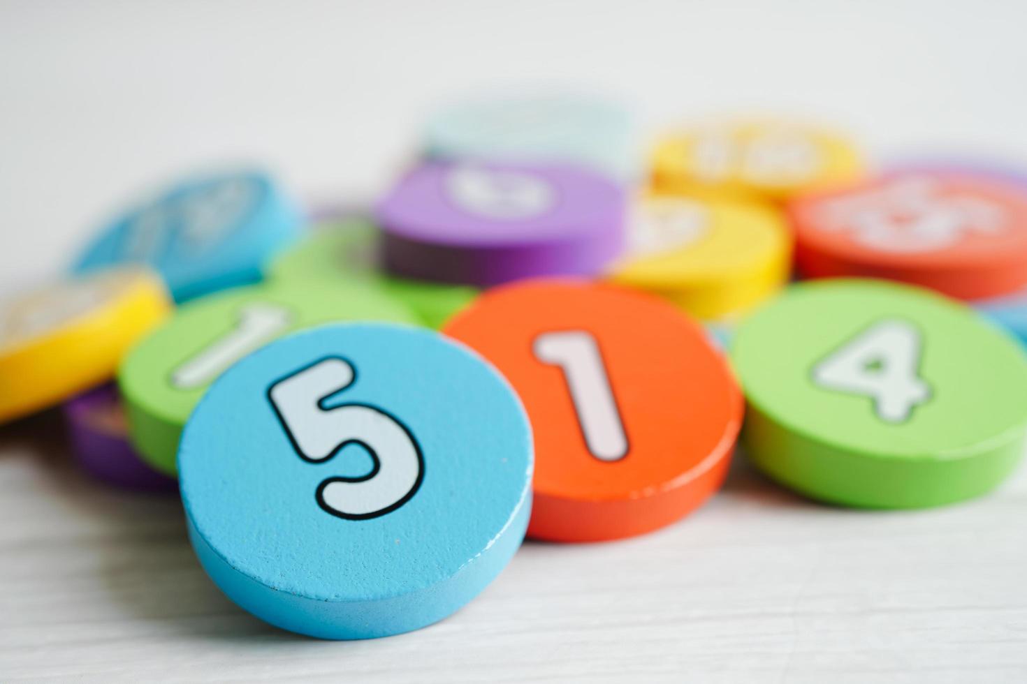 Number wood block cubes for learning Mathematic, education math concept. photo