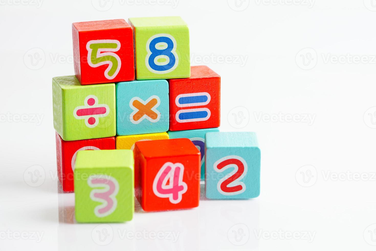 Number wood block cubes for learning Mathematic, education math concept. photo