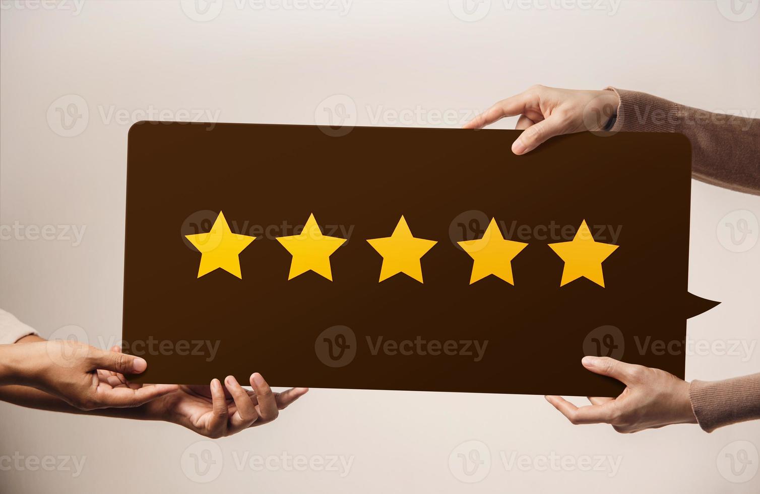 Customer Experience Concept. Happy Client giving Five Star Rating Review on a Huge Speech Bubble. Send Feedback to the Brand photo