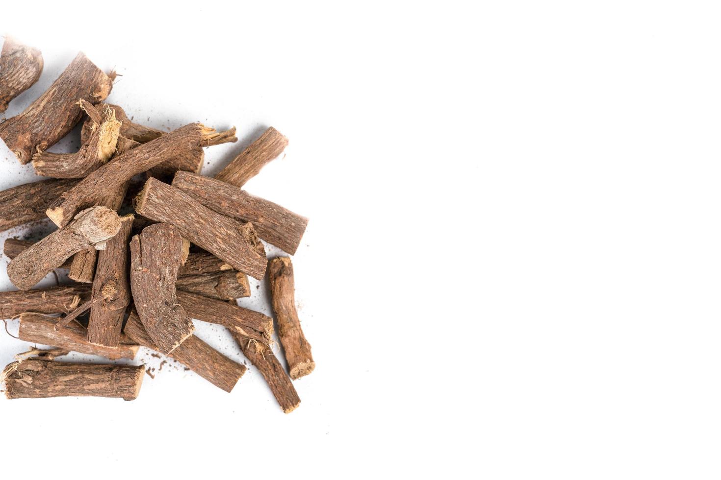 Ayurvedic Mulethi or Liquorice root stick or jeshthamadh on white background photo