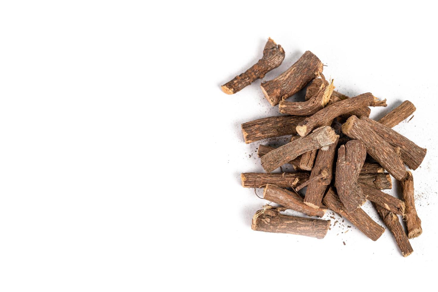 Ayurvedic Mulethi or Liquorice root stick or jeshthamadh on white background photo