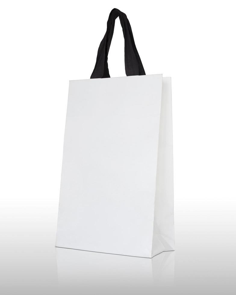 white paper bag on white background photo