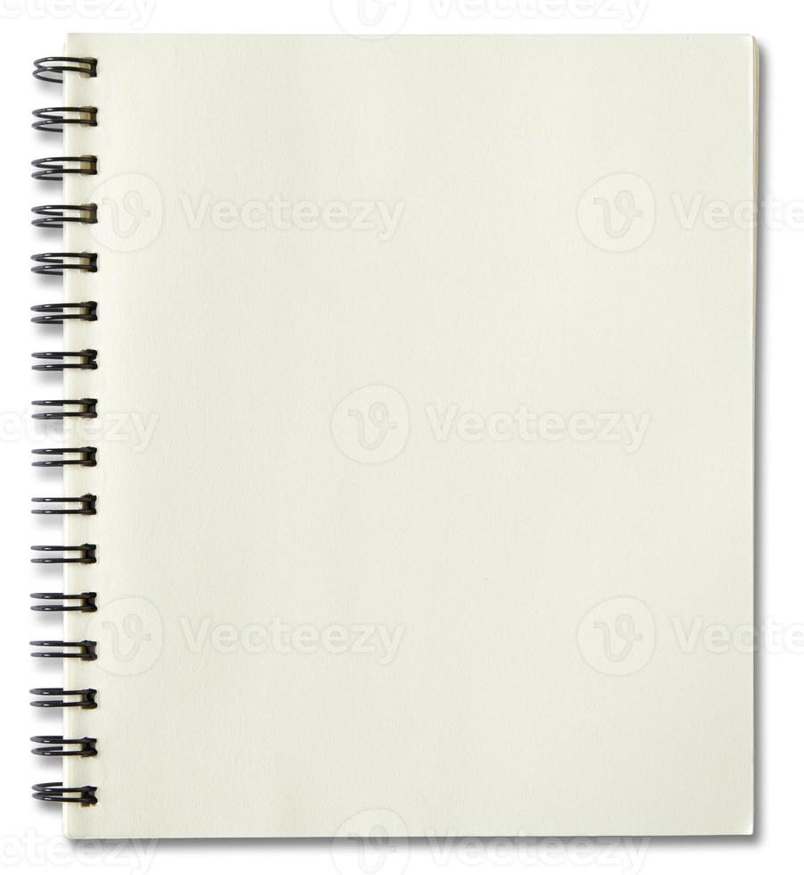 blank spiral notebook isolated on white background photo