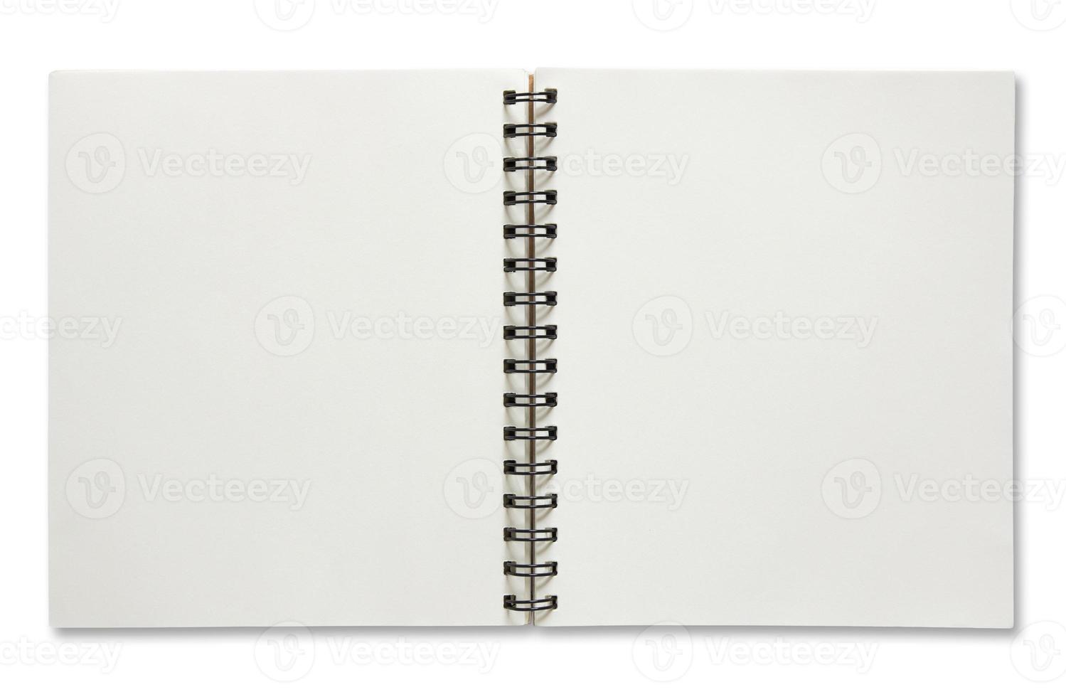 open spiral notebook isolated on white background photo