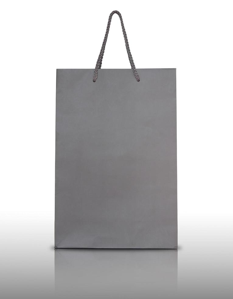 Gray paper bag on white background photo
