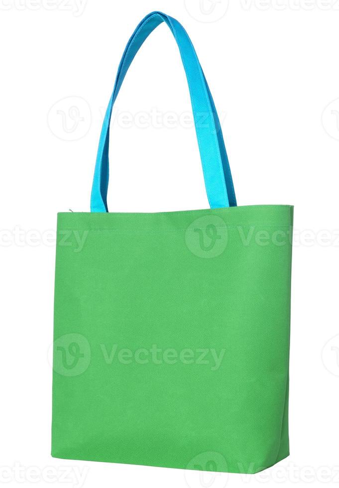 Green shopping fabric bag isolated on white background with clipping path photo