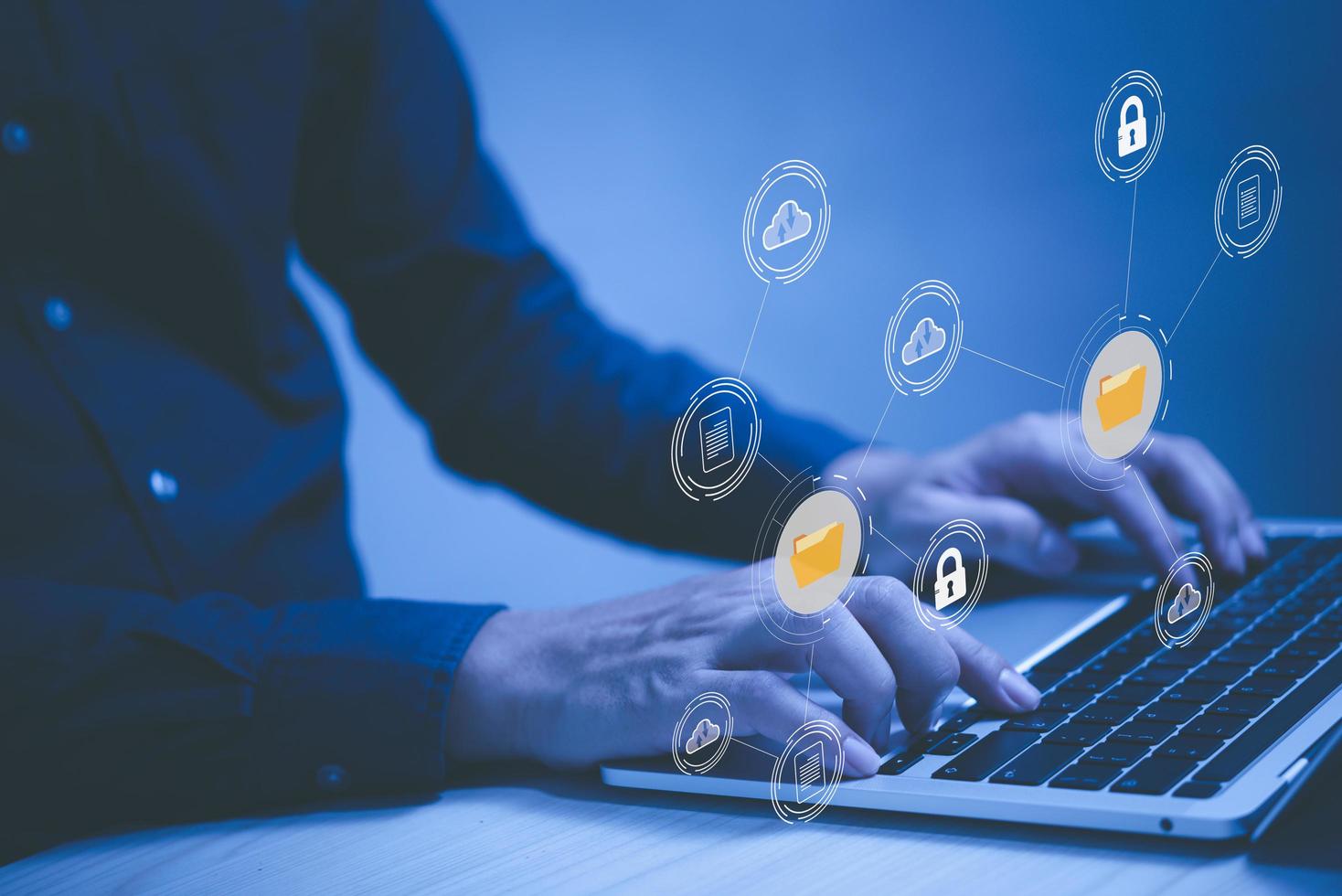 Cloud network storage Computer online technology for computer business virtual cloud service icons and hands on laptop keyboard Data transfer technology concept. photo