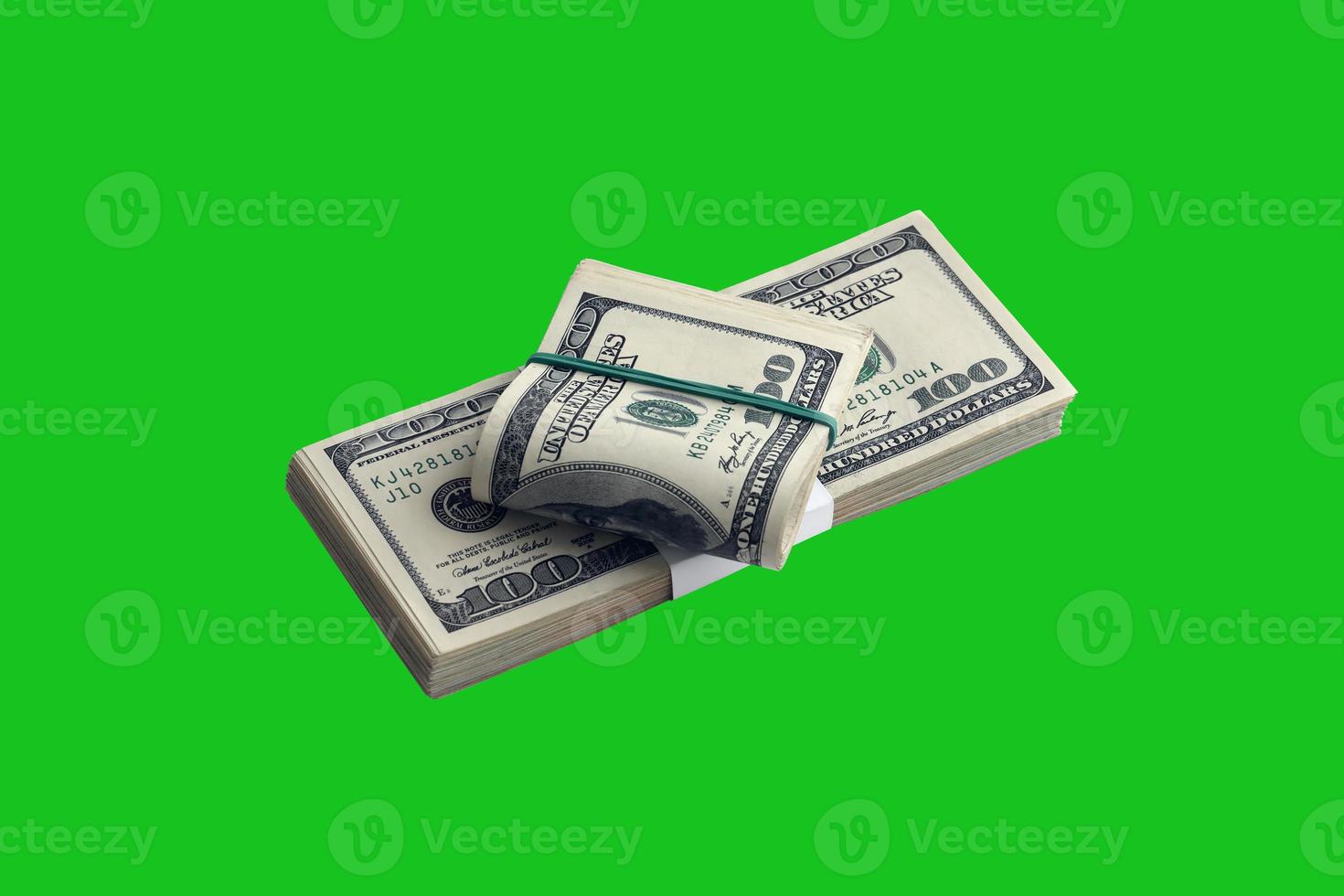 Bundle of US dollar bills isolated on chroma keyer green. Pack of american money with high resolution on perfect green mask photo