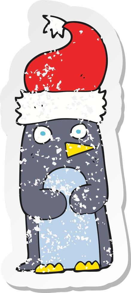 retro distressed sticker of a cartoon penguin in christmas hat vector