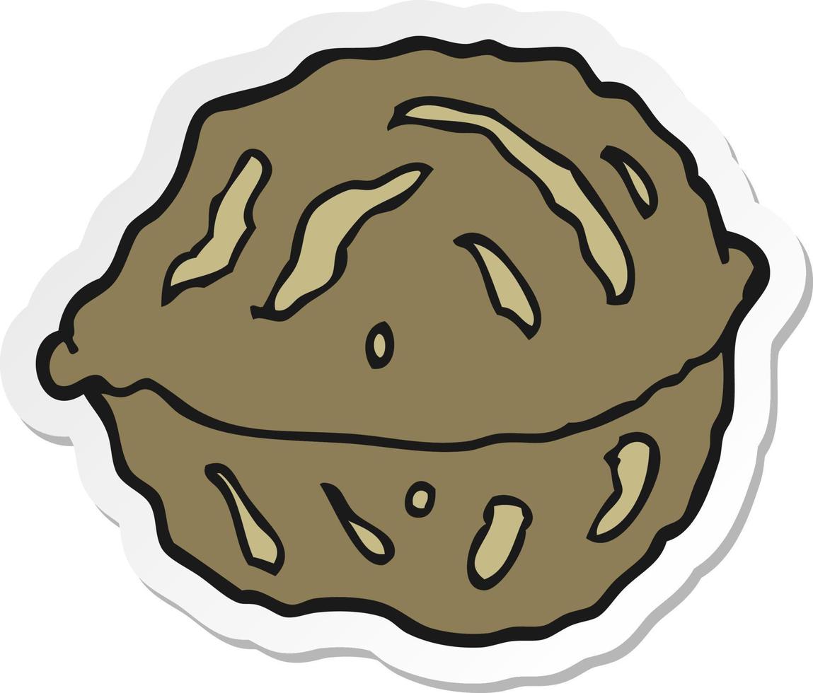 sticker of a cartoon walnut in shell vector