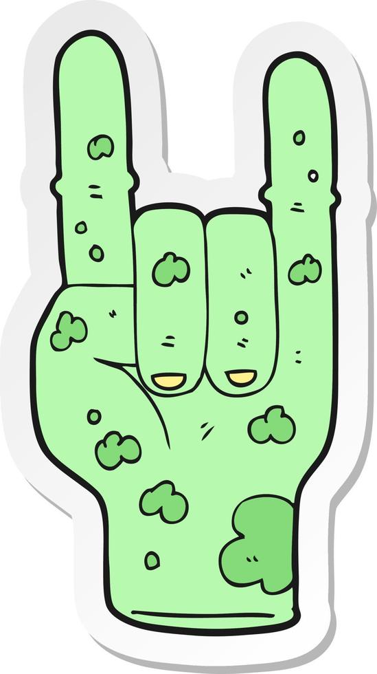 sticker of a cartoon zombie hand making horn sign vector