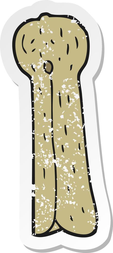 retro distressed sticker of a cartoon old wooden peg vector